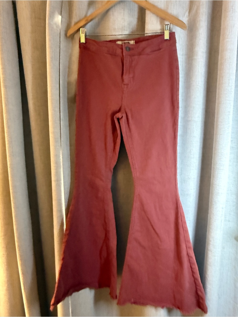 Flared High-Rise Jeans in Burnt Red